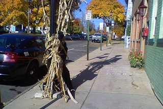 Assemblyman Robert Oaks chalk writing outside Lyons village offices