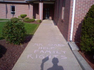 Assemblyman Robert Oaks - chalk to help family rights.
